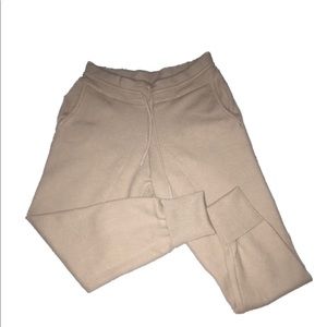 thick nude colored pants.